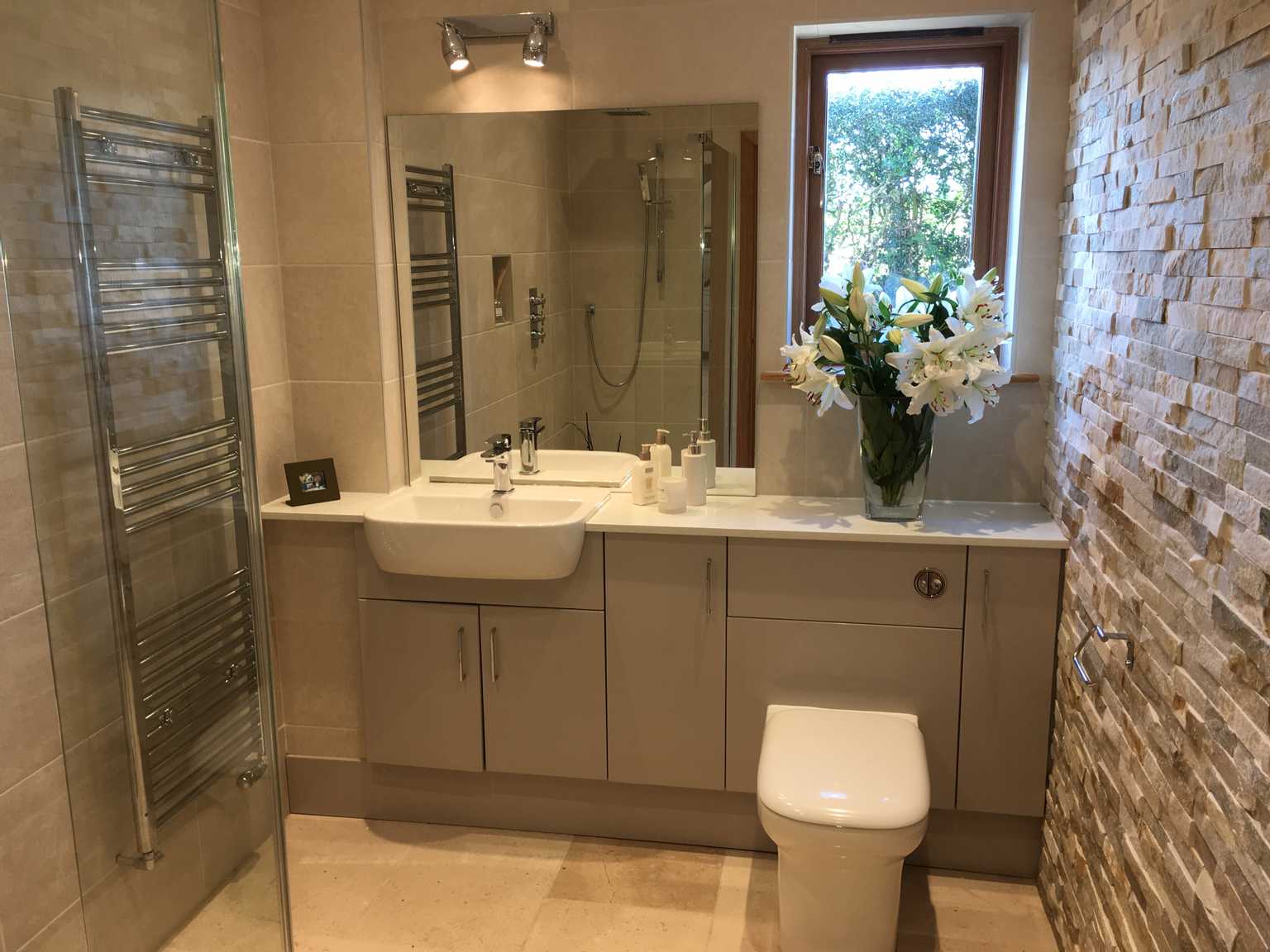 Bathroom Image with split face beige and cream tiles