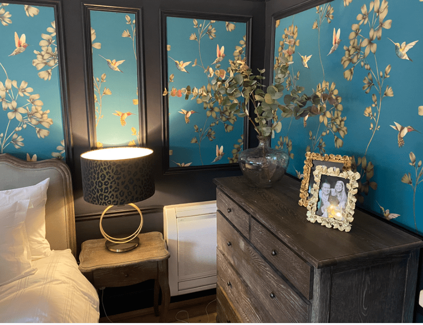 Lighting at the side of the bed in leopard print dark