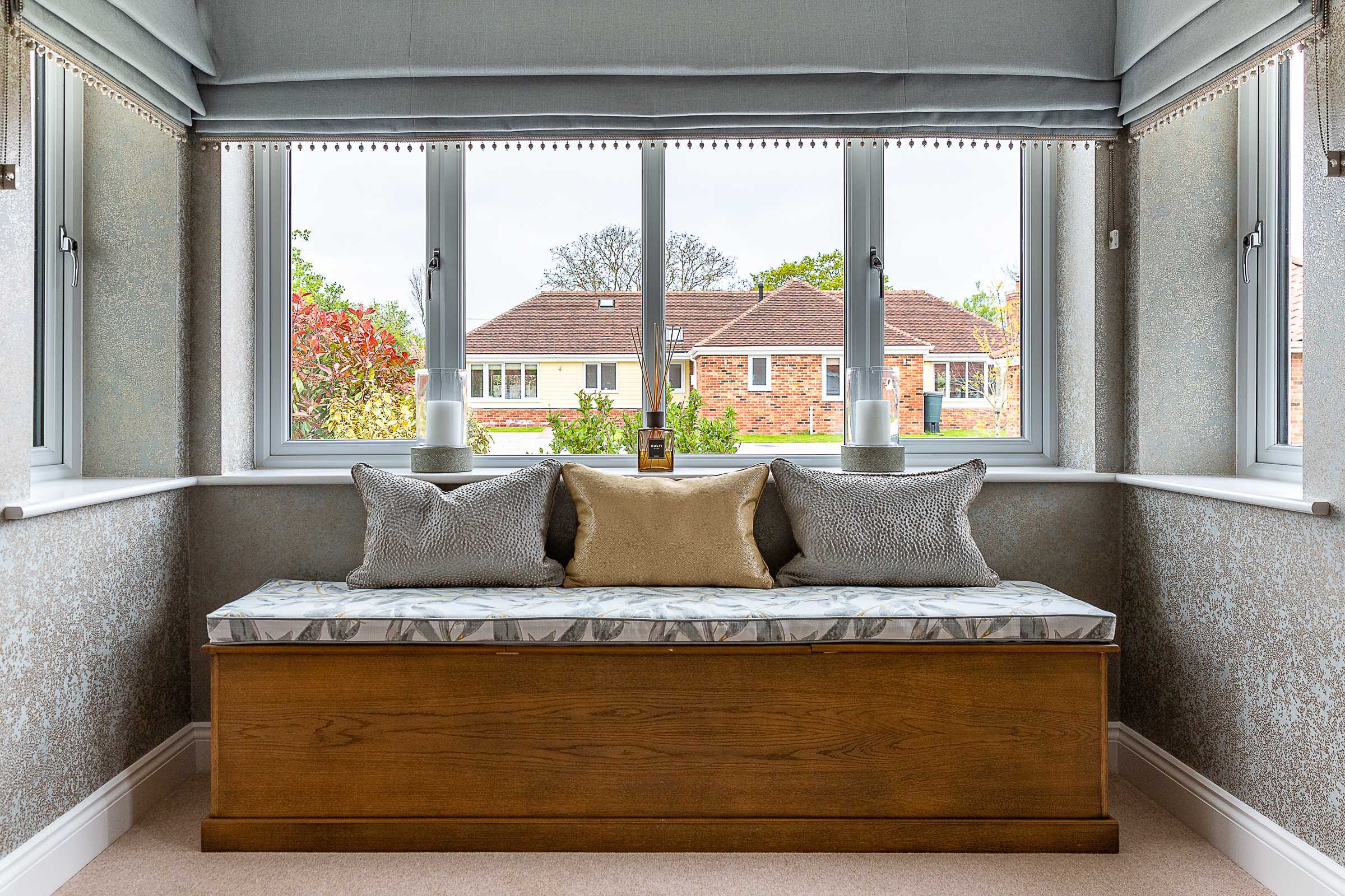 Grey blinds with bobble trim