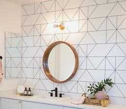 Rose gold mirror in bathroom